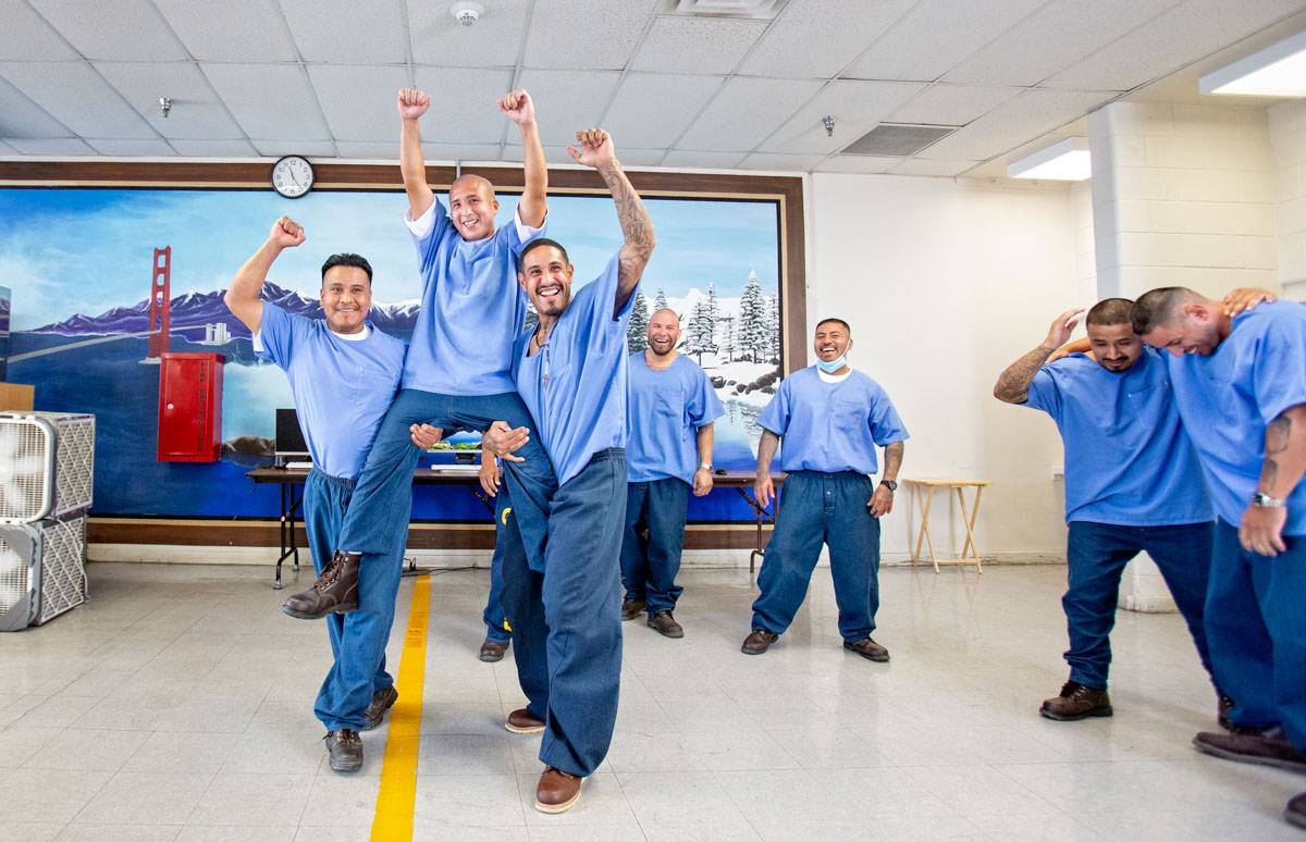 PAC participants perform theatrical exercises as part of a collaborative multidisciplinary workshop at Ironwood State Prison. Image courtesy of Peter Merts, 2022.