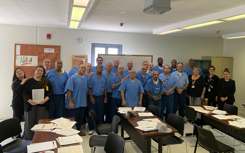  Team members from SDSU and Centinela State Prison with one of the two first cohorts of students in the SDSU-VISTA program at Centinela State Prison.